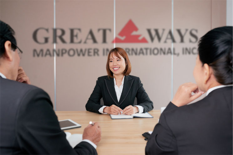 young woman participating in a meeting about establishing Recruitment agency for New Zealand at the Greatways office.