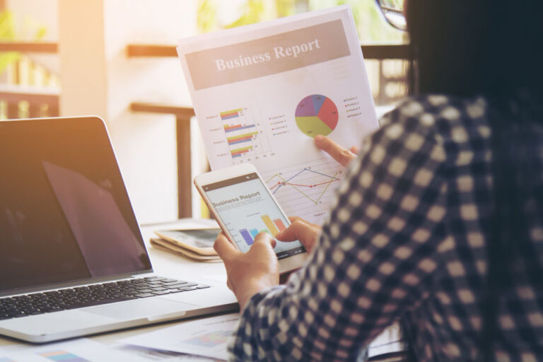 female business professional assessing the company's reputation growth