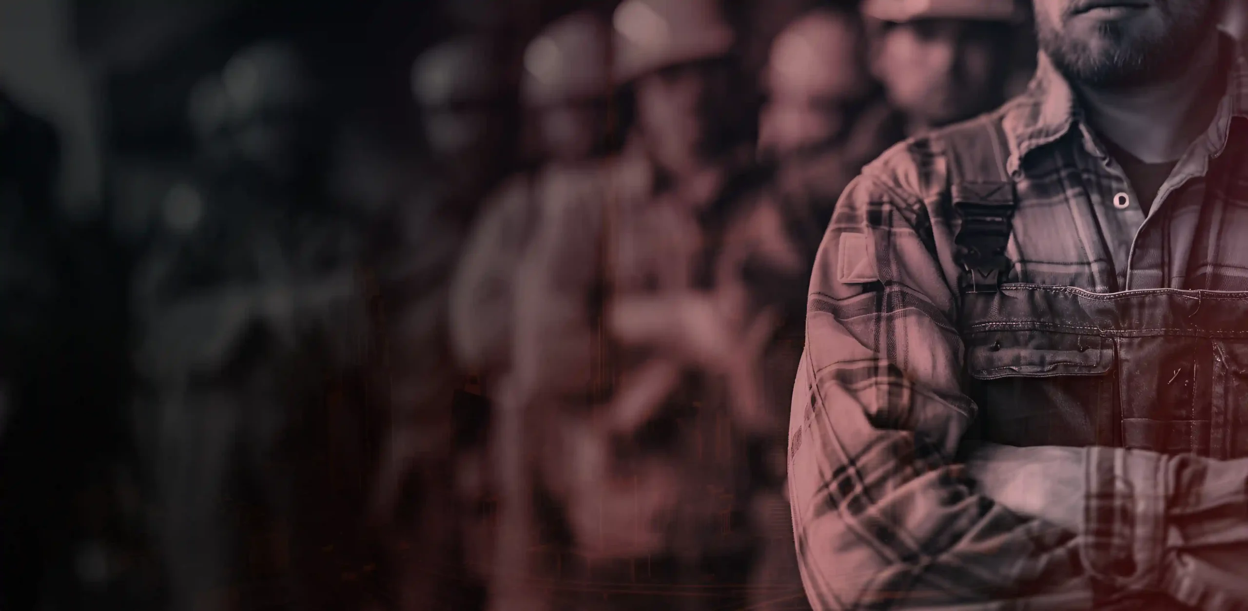 Industrial workers in safety gear standing united—a construction team showcasing strength, solidarity, and skilled labor force.